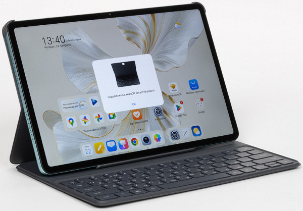 The tablet is inserted between the protruding “ears” of the cover, and in typing mode the entire structure looks like this (picture above)