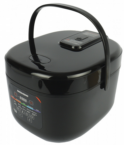 The device is a typical multicooker with streamlined shapes and an attractive design. The body is made of black heat-resistant plastic, which gives it a modern look. The front panel features a convenient control panel with touch buttons and a bright LED display.