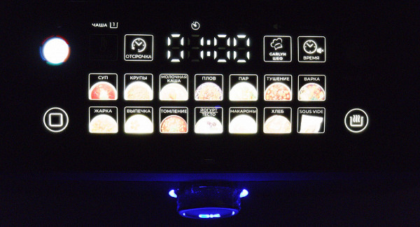 Our studio photo is overexposed. In fact, each button with a cooking mode also has a colorful design. Below we have presented a photo of the display during operation of the device.