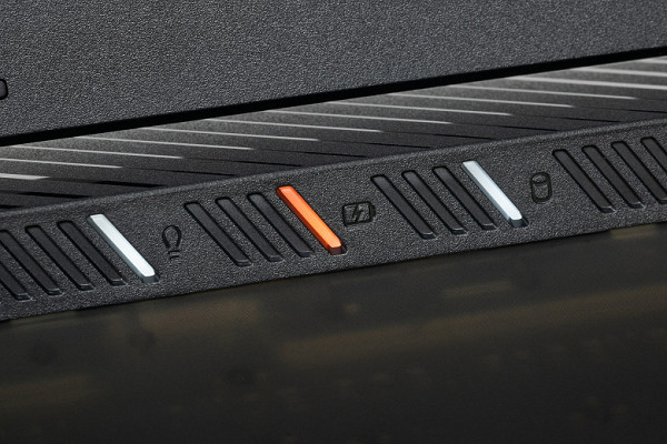 Under the lower frame of the screen on the raised surface of the case there are LED indicators for laptop operation, battery charging and system storage activity.