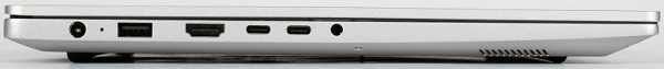 On the left side of the device there is a coaxial power connector with a power indicator, a USB Type-A port, a standard HDMI for video output, two USB Type-C ports and a combined audio jack for headphones and microphone. Both Type-C ports support DisplayPort video transmission and PowerDelivery, and either one can be used to charge the laptop.