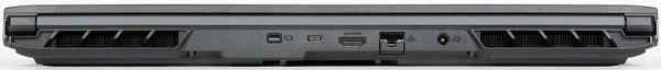 On the rear panel you can see grilles of holes and radiator lamellas, through which hot air is discharged from the interior of the laptop. Between the grilles are a Mini-DisplayPort connector, a USB Type-C port (USB3.2 Gen2), an HDMI video output, an RJ-45 socket for connecting to a gigabit Ethernet network, and a coaxial power adapter connector.