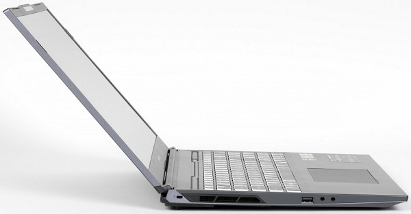 The maximum opening angle of the lid is 130°. When closed, it is held only by hinges and a closer, without the use of locks or magnets, but it is held securely. The hinges are quite stiff and the base isn't heavy enough, making it impossible to open the laptop with one hand: the case doesn't serve as a counterweight and tends to lift up and slide back.