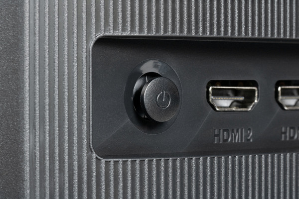 The power connector and interface connectors are located in the same niche at the back and are oriented towards the rear