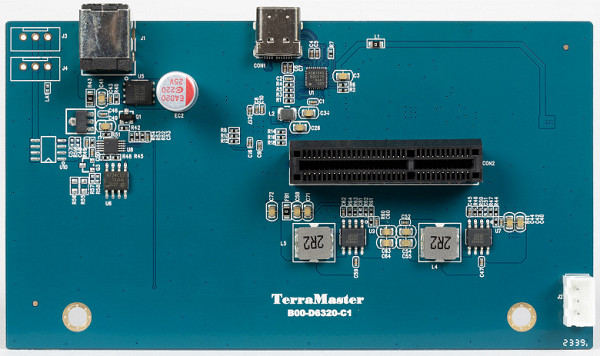 SATA and power connectors are mounted on the internal rear panel, mounted vertically inside the case.