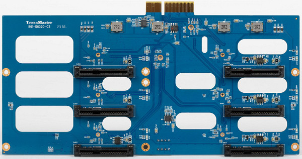 SATA and power connectors are mounted on the internal rear panel, mounted vertically inside the case.