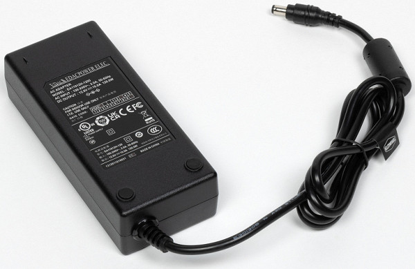 The power adapter, similar to those used in laptops, is suitable for use in household electrical networks with a voltage of 100-240 V and a frequency of 50/60 Hz. It provides an output voltage of 12 V at 10 A (rated power 120 W).