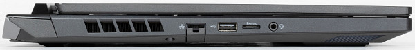 On the left side panel there is a cooling outlet grille, an RJ-45 connector for network connection, a USB 2.0 Type-A port, a slot for microSD memory cards and a combined audio jack for a headset (3.5 mm minijack).