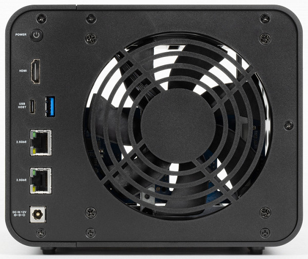 On the back of the device is a large cooling unit, which is part of the back panel. It is secured to the mounting frame with six screws located at the top and bottom. On the right are the Power button, HDMI video output, USB 3.2 Gen2 Type-C and Type-A ports, two 2.5 Gbps Ethernet sockets, and at the bottom is a coaxial connector for connecting the power adapter.