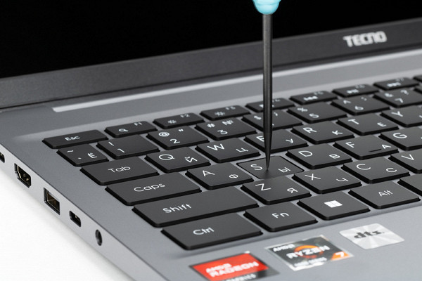 The laptop uses a full-size membrane-type keyboard with a small (about 1.5 mm) vertical key travel.